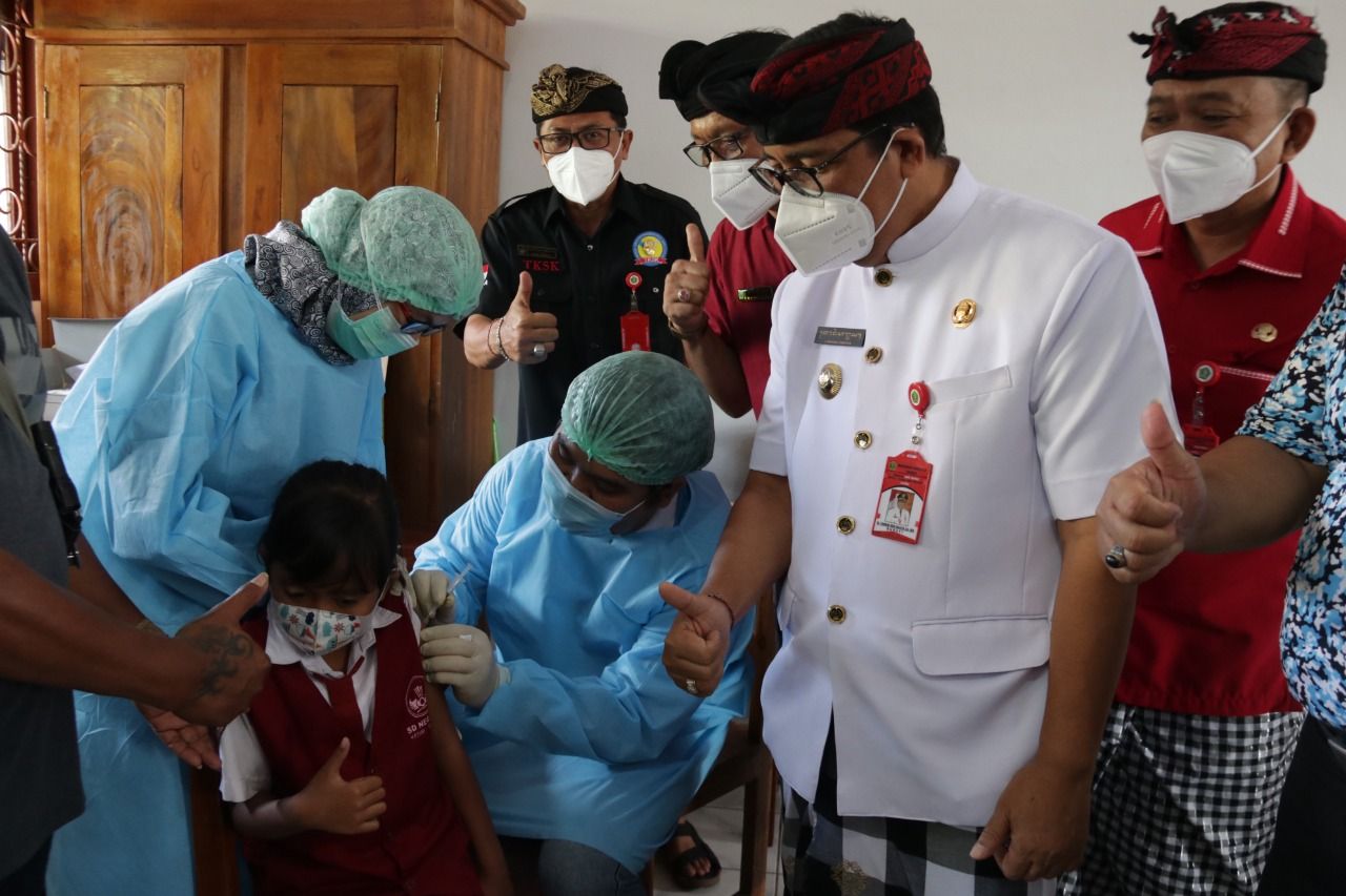 podiumnews.com-Komitmen Tabanan Tuntaskan Vaksinasi Usia 6-11 Tahun